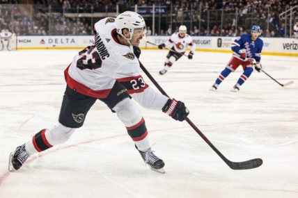Mar 2, 2023; New York, New York, USA; Ottawa Senators defenseman Travis Hamonic (23) shoots the puck during the third period against the New York Rangers at Madison Square Garden. Mandatory Credit: Vincent Carchietta-USA TODAY Sports