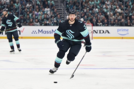 Apr 28, 2023; Seattle, Washington, USA; Seattle Kraken defenseman Will Borgen (3) advances the puck in game six of the first round of the 2023 Stanely Cup Playoffs at Climate Pledge Arena. Mandatory Credit: Steven Bisig-USA TODAY Sports